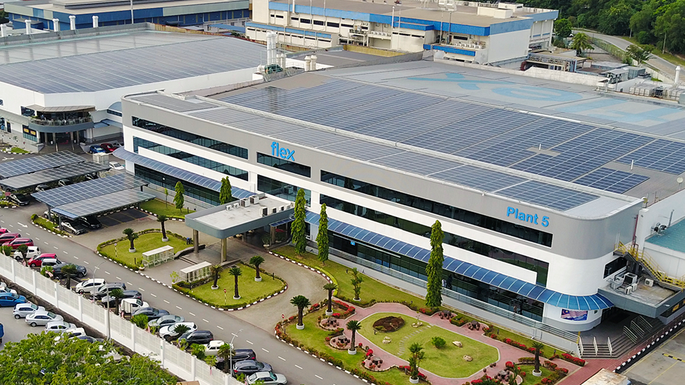 Flex location with solar panels on roof for clean energy to reduce greenhouse gas emissions